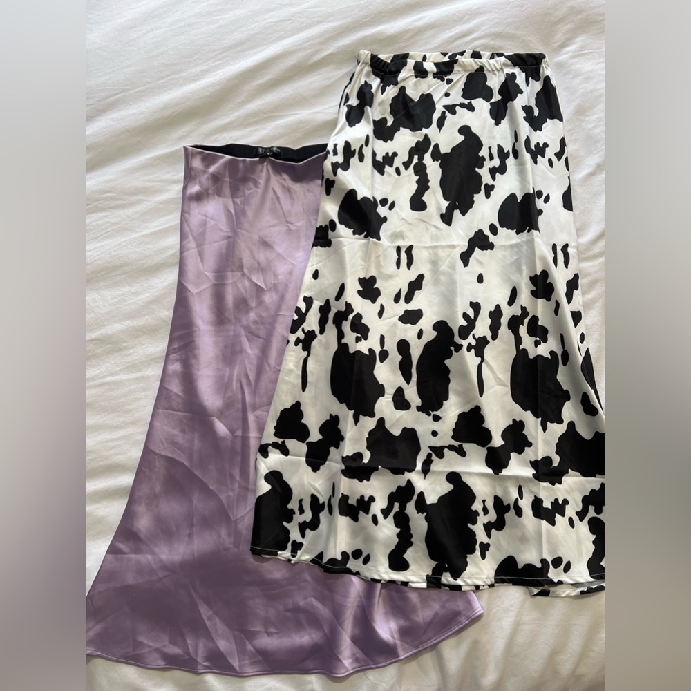Two long  soft skirts. Size small
